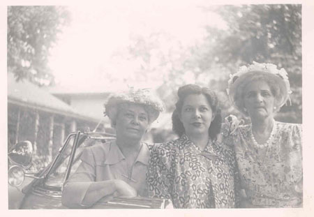 3 women by car